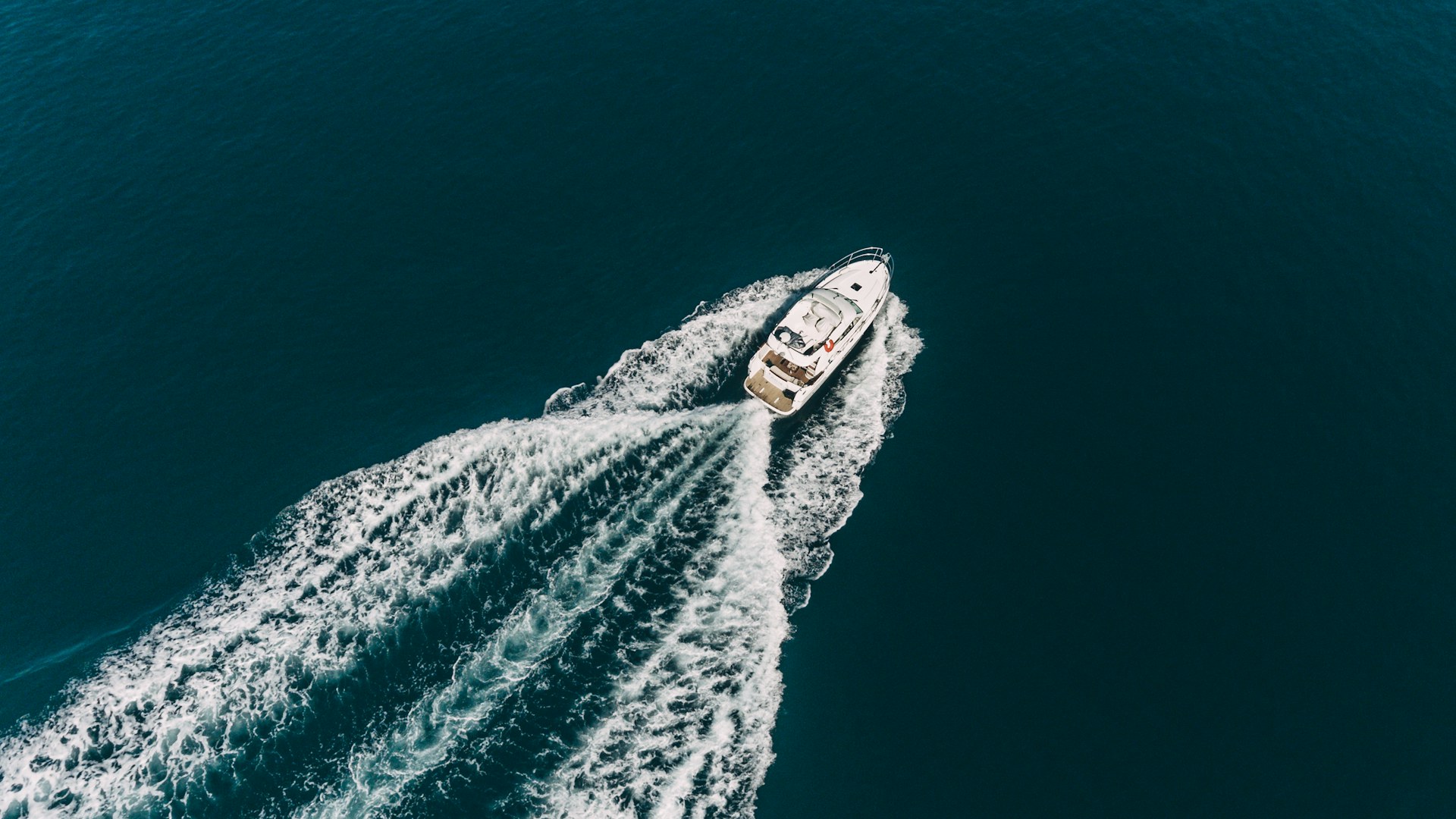 Motor yacht cruising at full speed